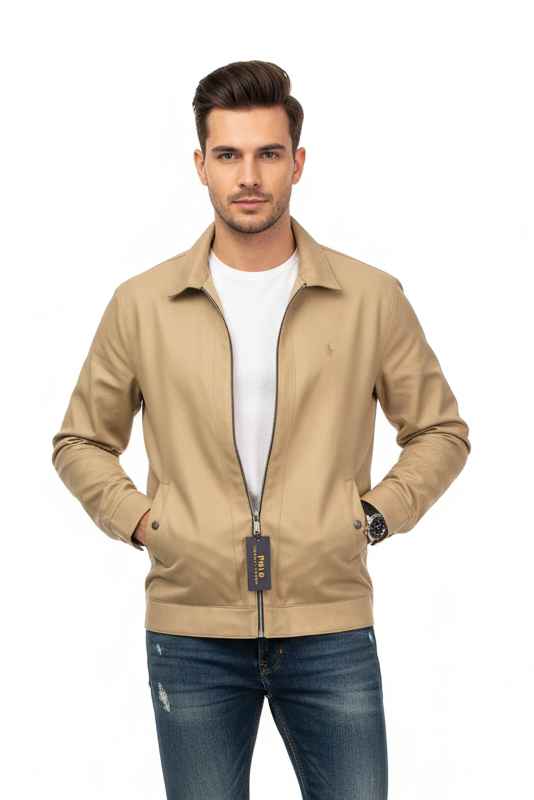 Man wearing a beige jacket and blue jeans on a white background